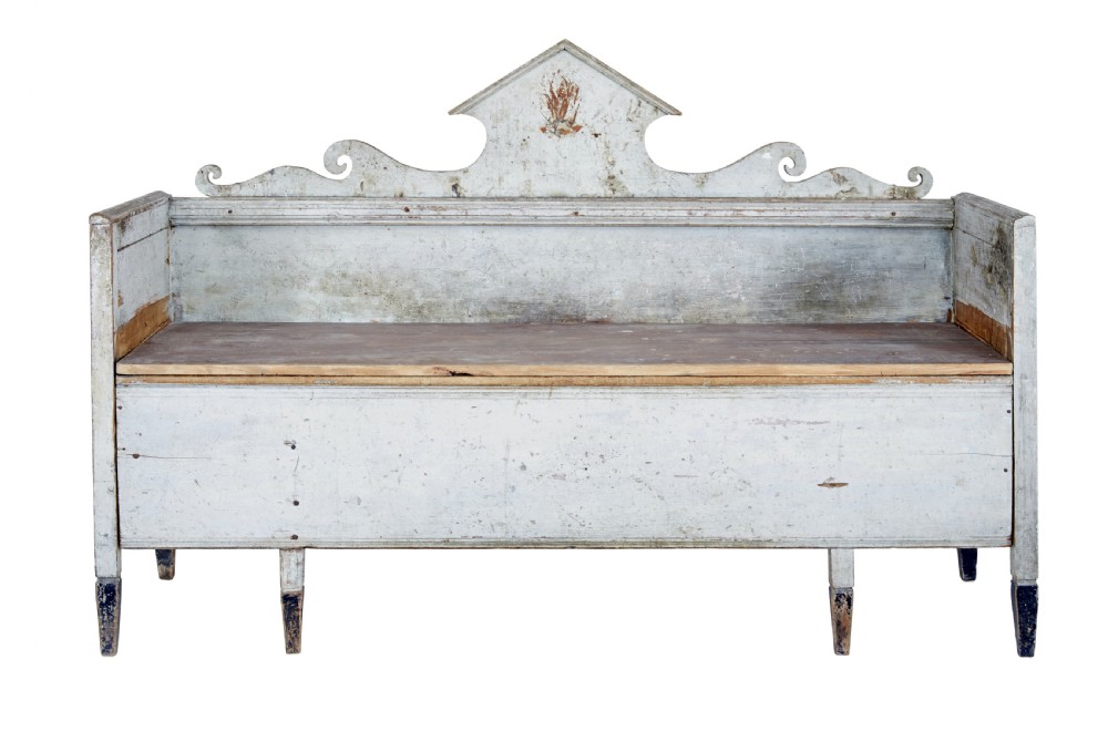 An early 19th-century Swedish Gustavian bench in distressed grey paint featuring a pedimented backrest and tapered legs. View II