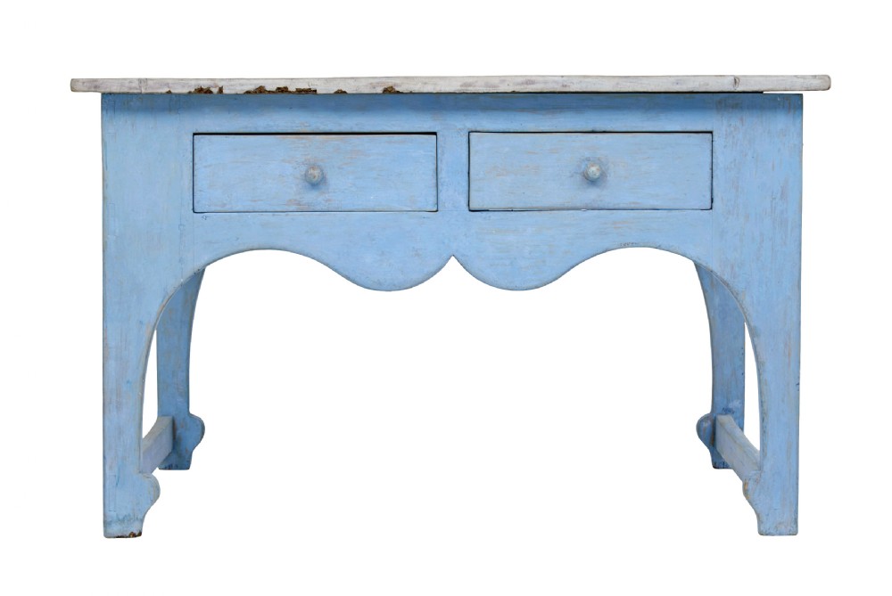 A mid 19th-century Swedish pine side table painted light blue with two drawers, wooden knobs, and an arched lower apron. View II