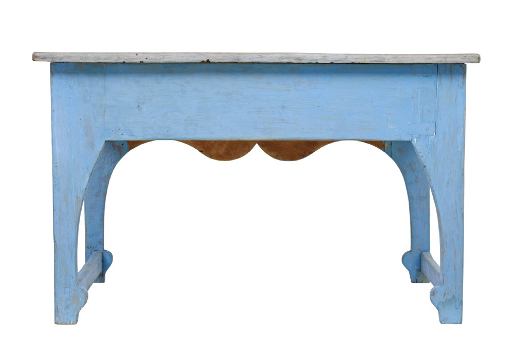A mid 19th-century Swedish pine side table painted light blue with two drawers, wooden knobs, and an arched lower apron. View V