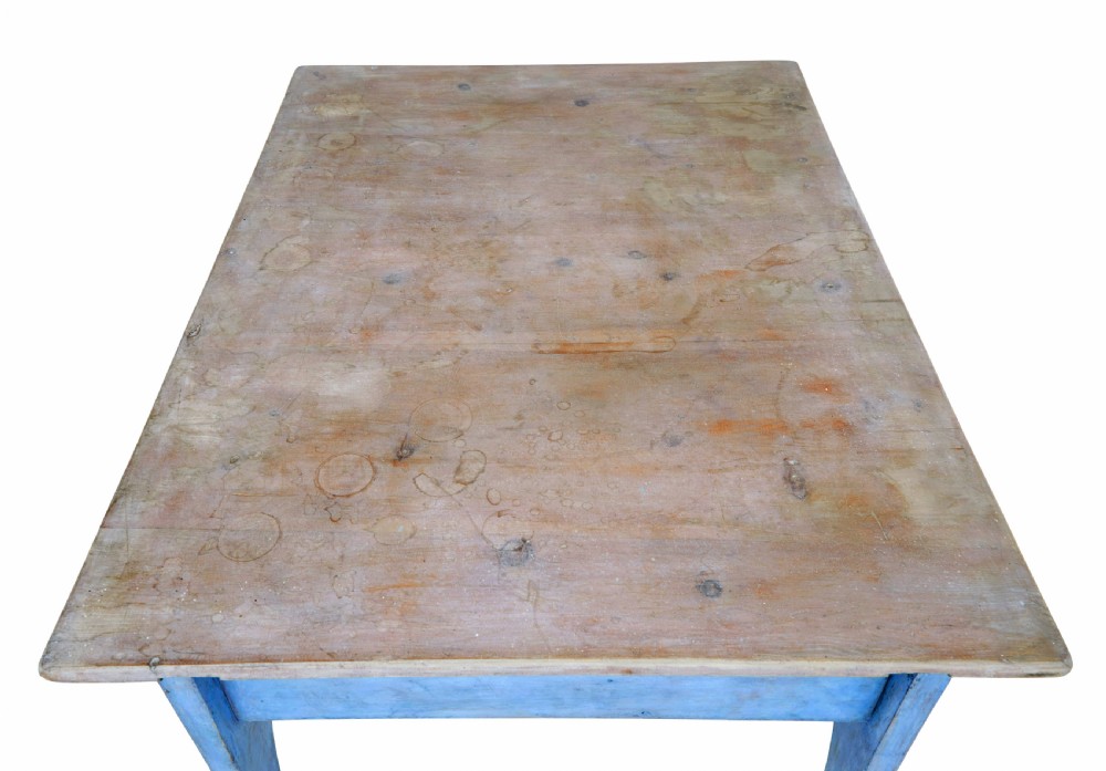 A mid 19th-century Swedish pine side table painted light blue with two drawers, wooden knobs, and an arched lower apron. View VI