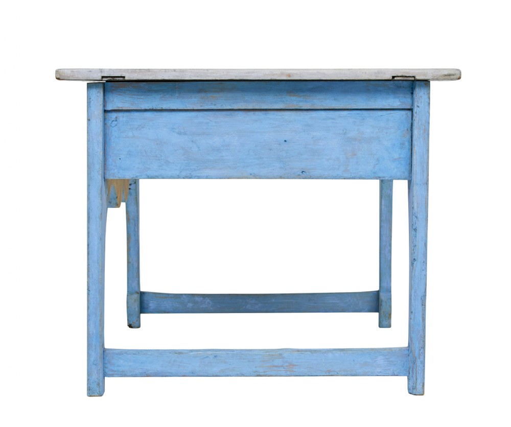 A mid 19th-century Swedish pine side table painted light blue with two drawers, wooden knobs, and an arched lower apron. View VII