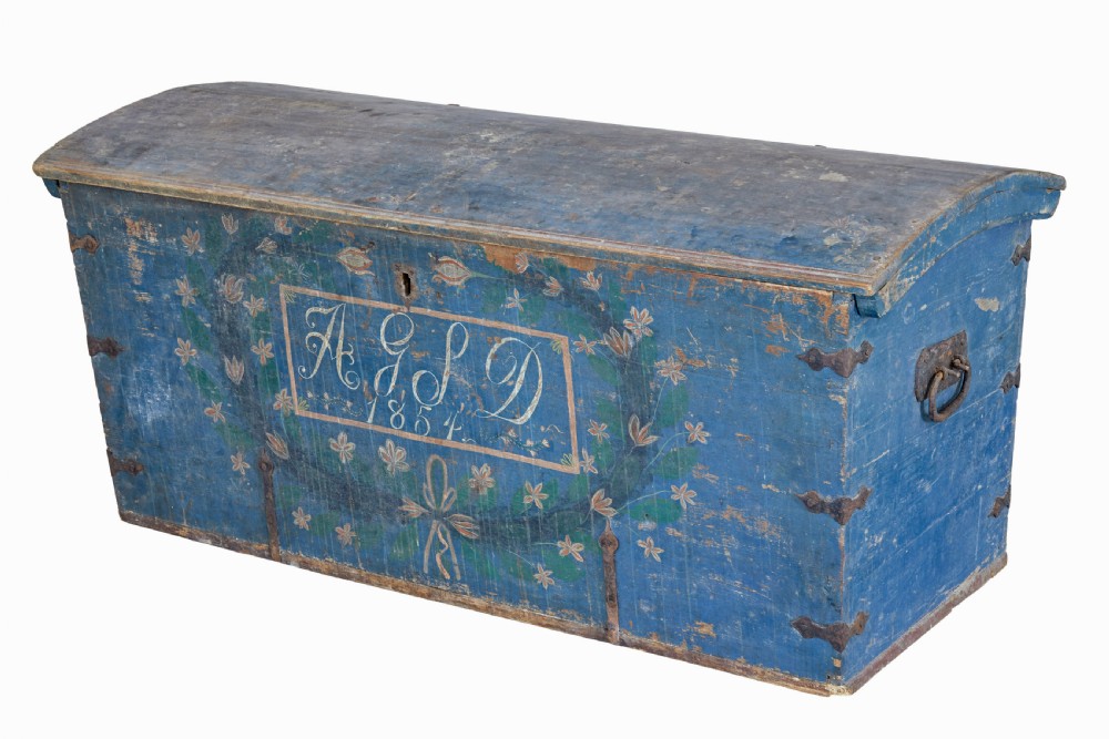 A nineteenth-century Swedish pine coffer painted in blue featuring hand-lettered initials AGSD dated 1854, floral wreath decoration, and wrought iron fittings. View IV