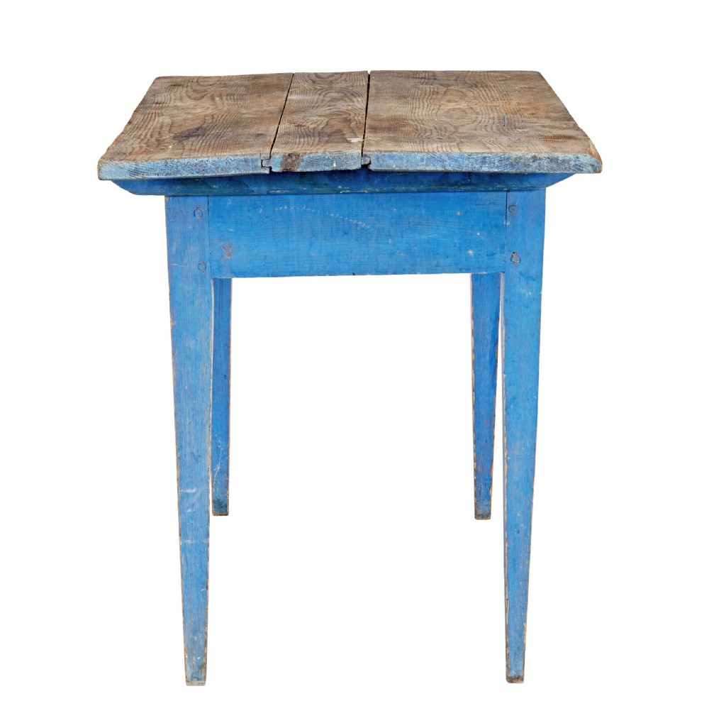 A 19th-century rustic side table featuring a blue painted apron and tapered legs with an unpainted natural pine plank top. View IV