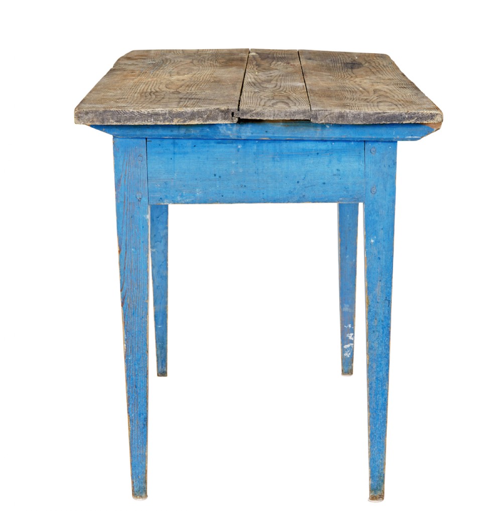 A 19th-century rustic side table featuring a blue painted apron and tapered legs with an unpainted natural pine plank top. View VI