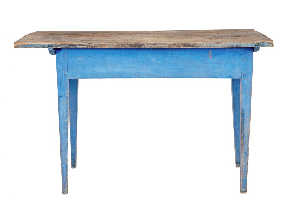 A 19th-century rustic side table featuring a blue painted apron and tapered legs with an unpainted natural pine plank top. View VII