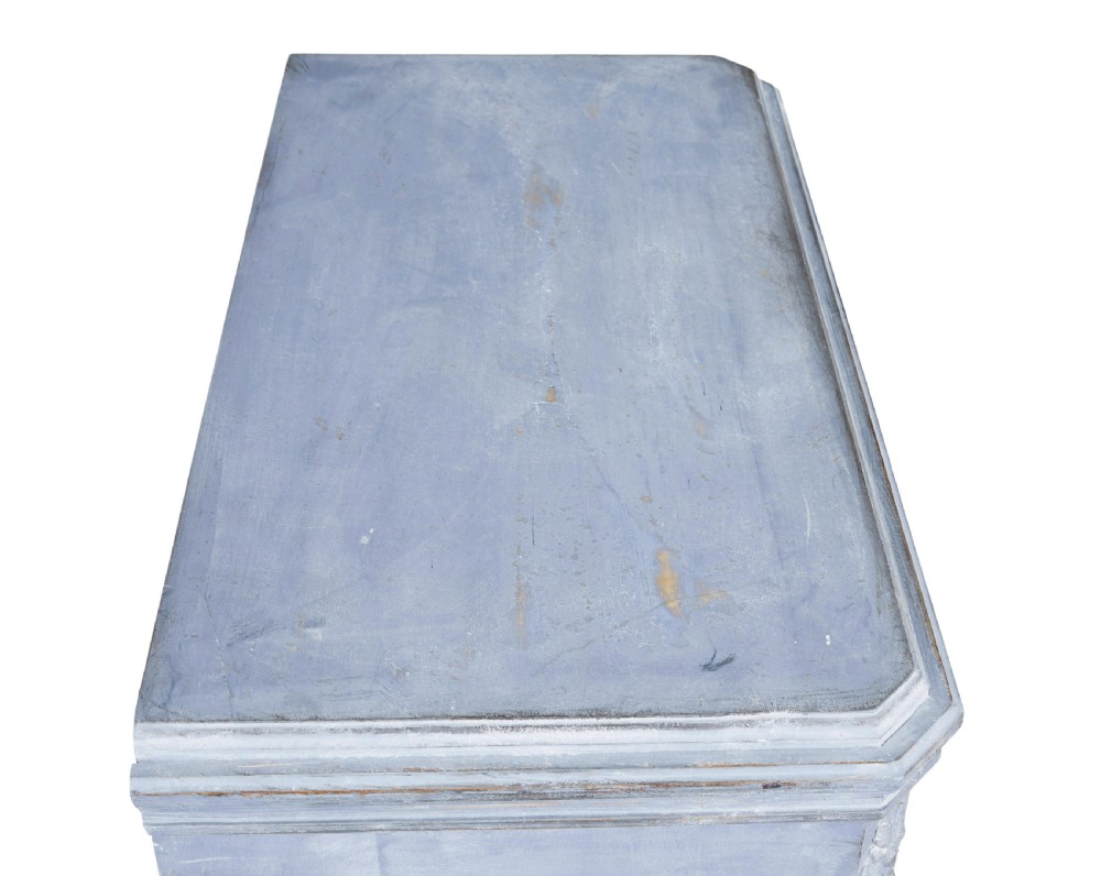 A pair of 19th-century light blue painted Swedish chests of drawers featuring three drawers, fluted sides, circular brass pull handles, and brass shield escutcheons. View X