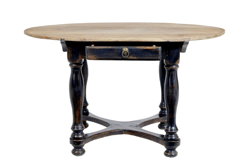 A rustic 19th-century circular occasional table featuring a natural wood top, a dark painted base with a single drawer, turned legs, and an X-shaped cross-stretcher. View II