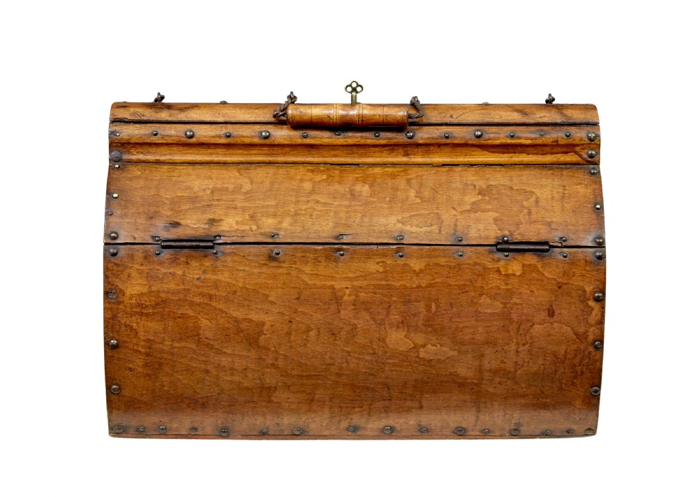 An early 20th-century Scandinavian wooden doctors bag featuring a curved timber body reinforced with iron rivets, a brass lock, and a turned wooden carry handle. View IV