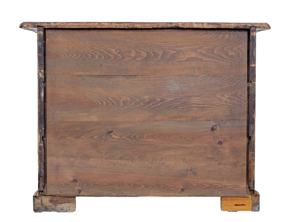 An 18th-century burr walnut serpentine-front chest of drawers featuring three long drawers with ornate brass handles and bracket feet. View VI