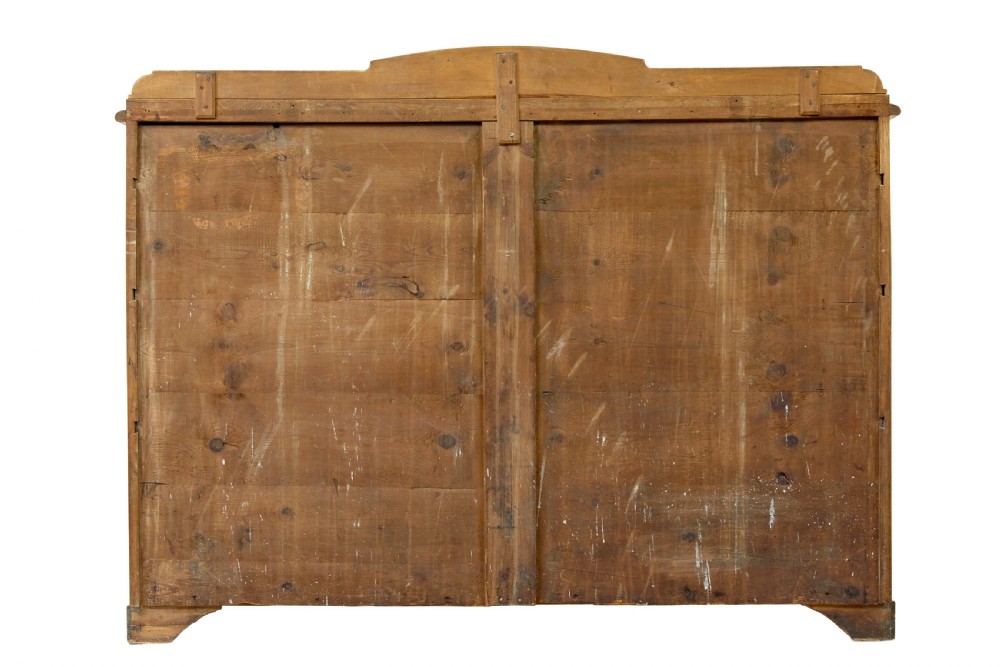 A mid-19th-century Swedish birch buffet sideboard featuring two top drawers, two cabinet doors, and curved side panels in a golden timber finish. View V