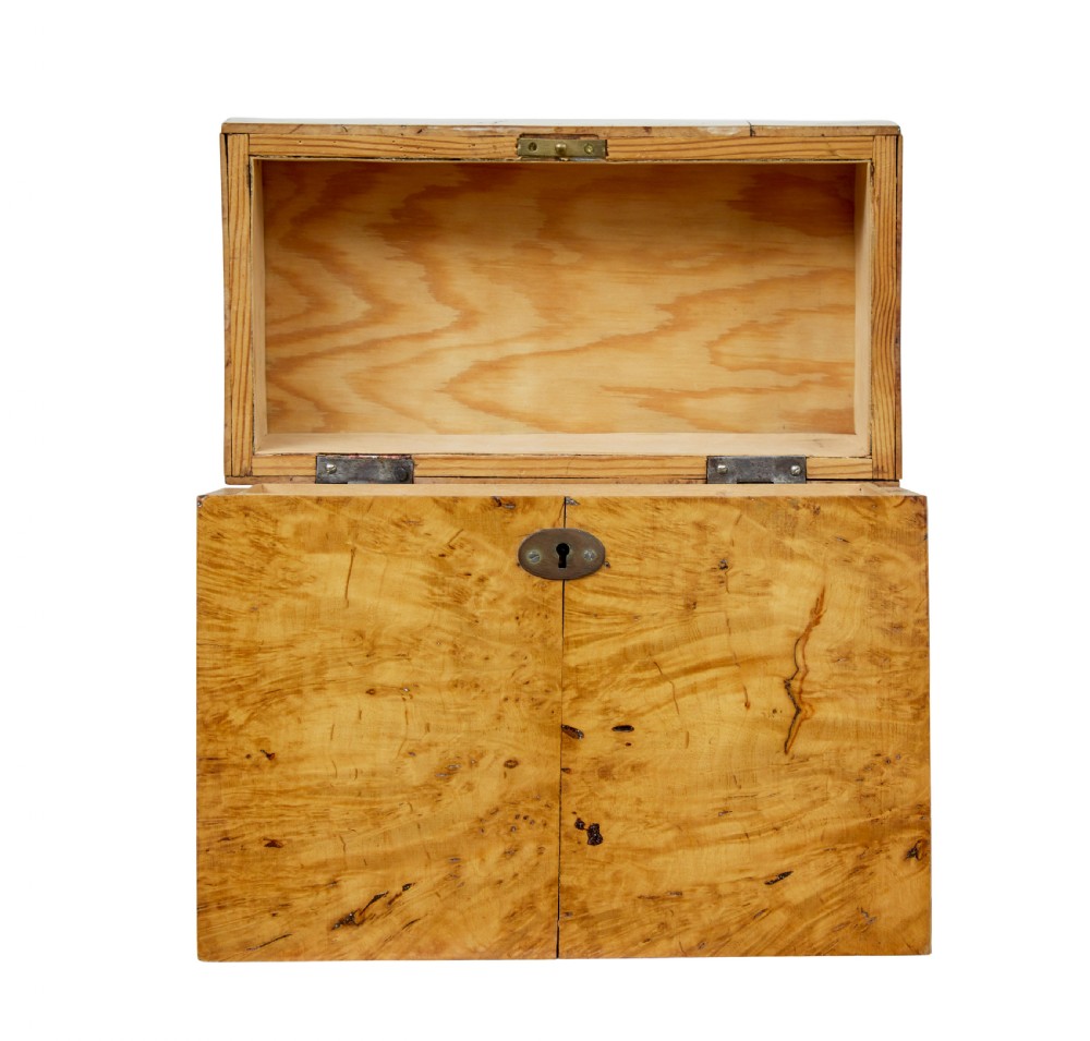 A 19th-century Swedish burr birch table box featuring prominent wood grain patterns, a top brass handle, and an oval brass escutcheon. View III