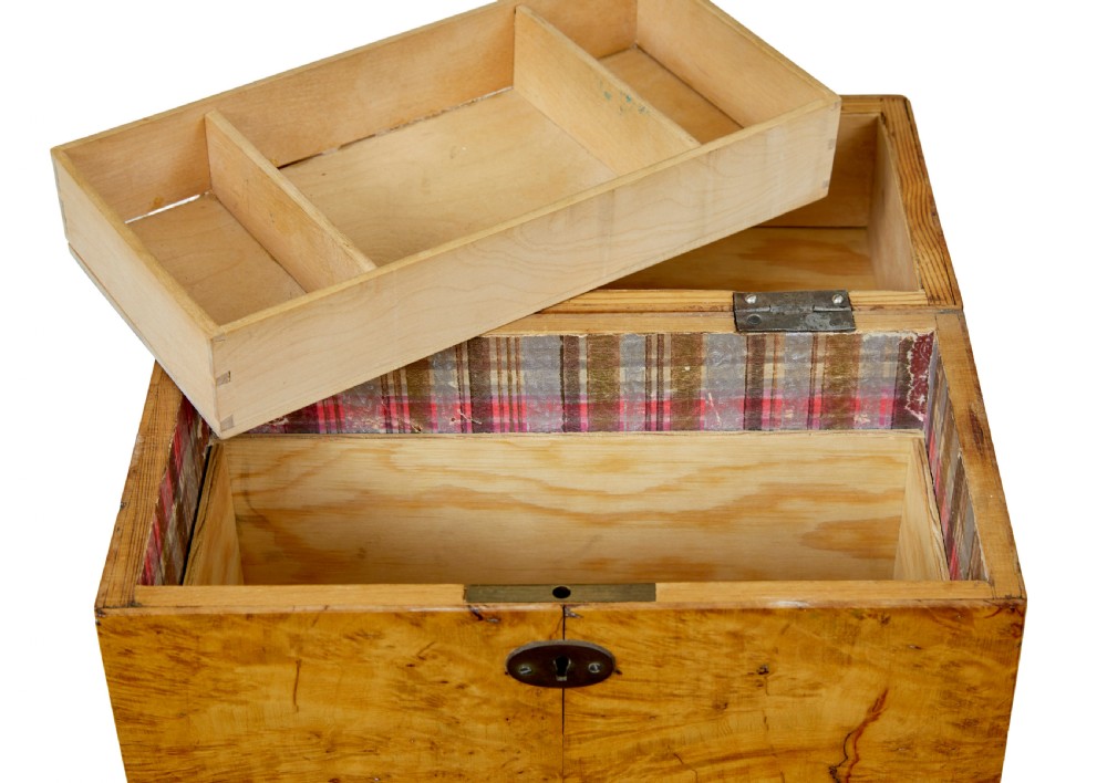 A 19th-century Swedish burr birch table box featuring prominent wood grain patterns, a top brass handle, and an oval brass escutcheon. View IX