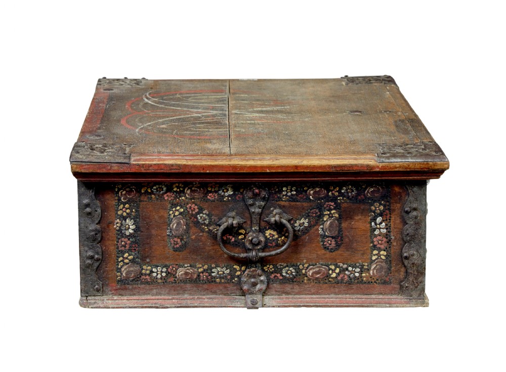 A 19th-century Swedish oak strongbox featuring wrought iron strapwork, side handles, and hand-painted floral motifs on the front panel. View VI