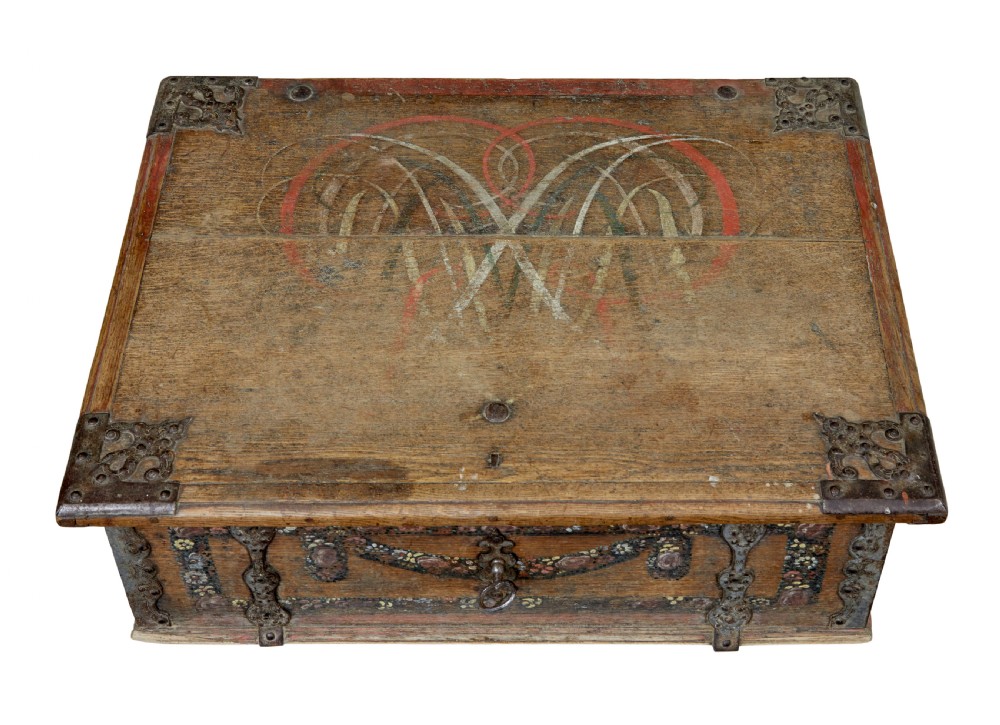 A 19th-century Swedish oak strongbox featuring wrought iron strapwork, side handles, and hand-painted floral motifs on the front panel. View VII