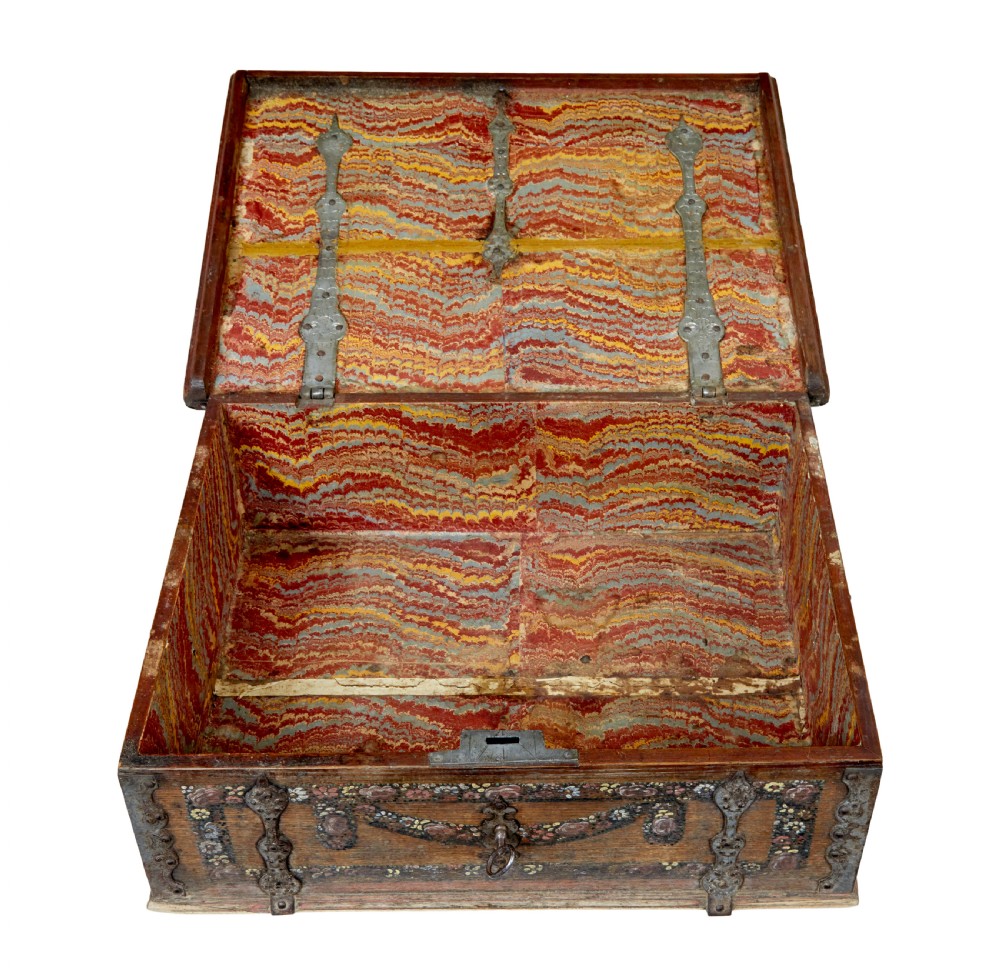 A 19th-century Swedish oak strongbox featuring wrought iron strapwork, side handles, and hand-painted floral motifs on the front panel. View VIII