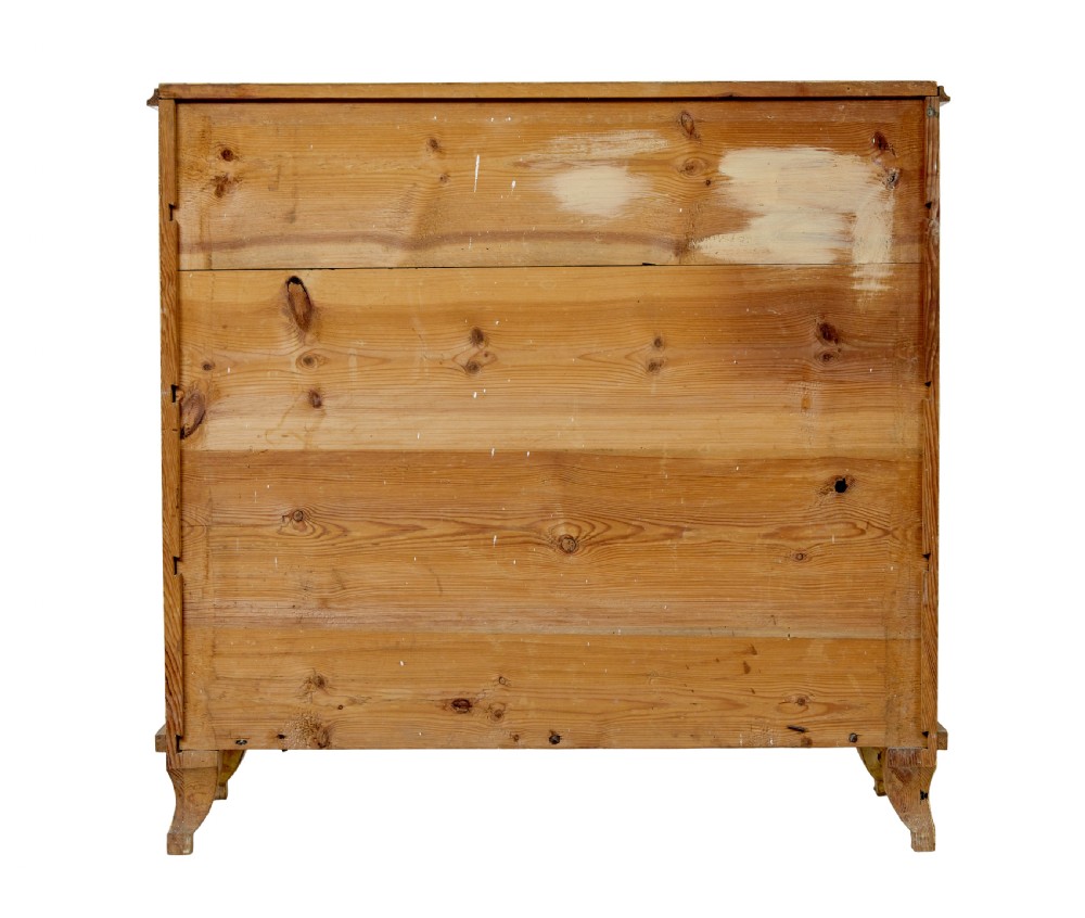 A mid-19th century Swedish northern pine chest of drawers featuring a yellow painted finish, four full-width drawers with black knobs, and black bobbin-turned corner columns. View X