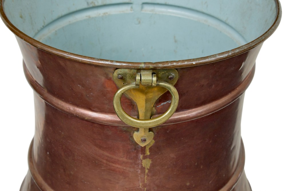 A 19th-century waist-shaped copper bucket featuring brass side handles and a tin-lined interior. View IV