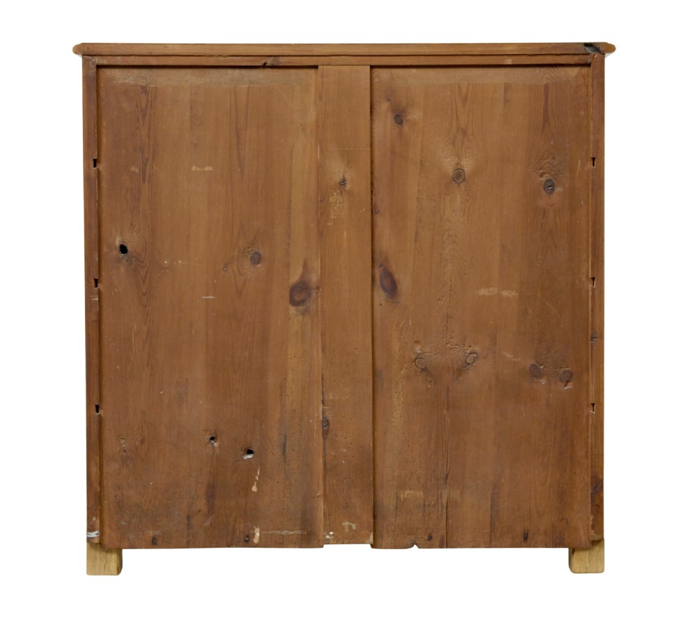 A 19th-century Swedish chest of four drawers crafted from golden flame birch veneer with simple keyhole escutcheons and square legs. View V