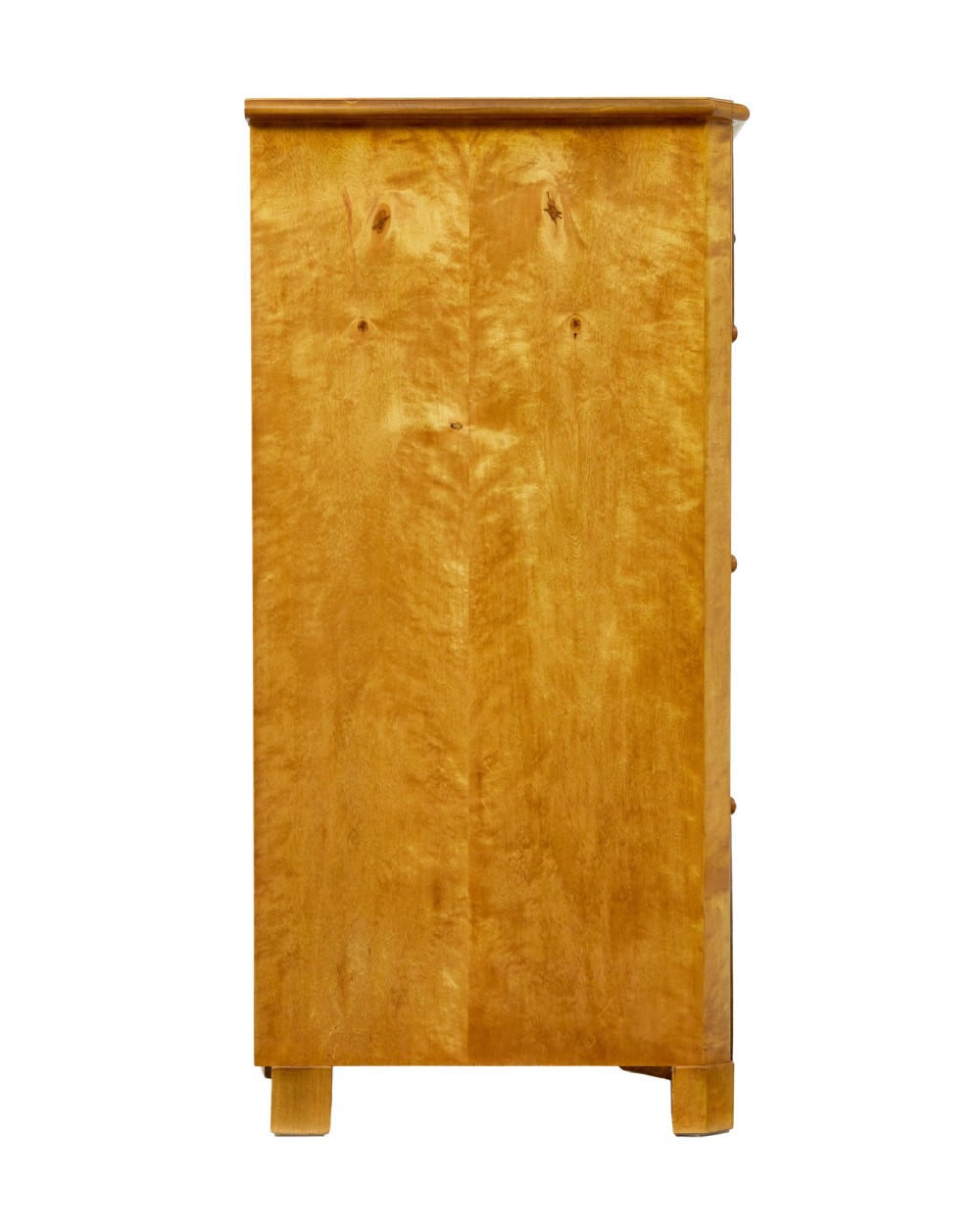 A 19th-century Swedish chest of four drawers crafted from golden flame birch veneer with simple keyhole escutcheons and square legs. View VI