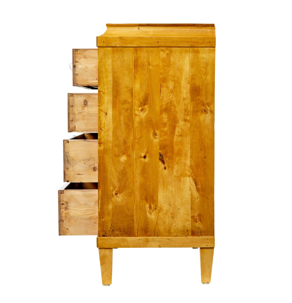 A 19th-century Swedish birch chest featuring four drawers with brass escutcheons, a stepped caddy top moulding, and tapered square legs. View IV