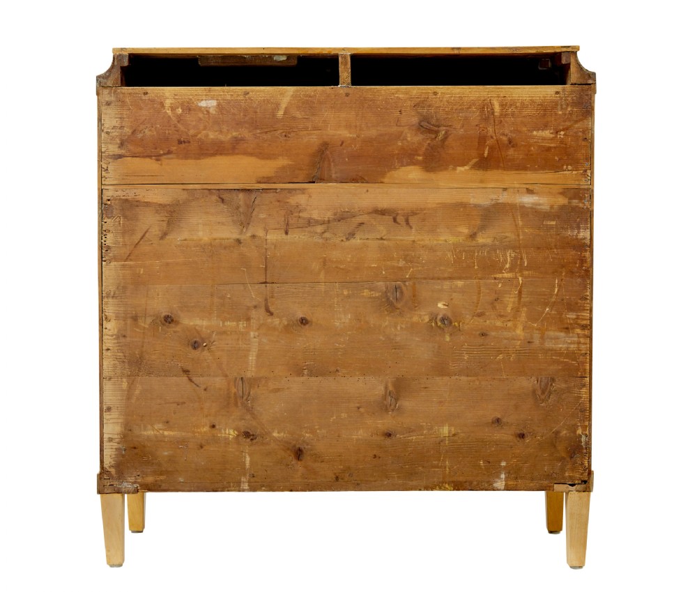 A 19th-century Swedish birch chest featuring four drawers with brass escutcheons, a stepped caddy top moulding, and tapered square legs. View V