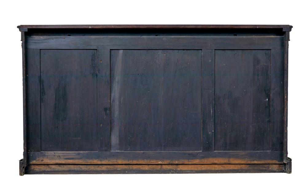 A mid-19th century Victorian walnut credenza featuring three glass-fronted doors, intricate marquetry inlay, and ornate gilt-bronze mounts. View VI