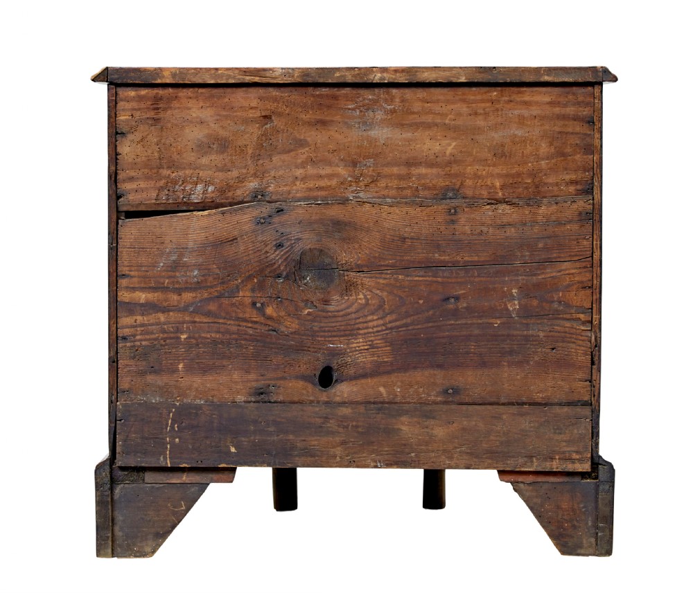 An eighteenth-century Queen Anne walnut kneehole desk featuring figured walnut veneers, brass drop handles, a central recessed cupboard, and bracket feet. View XI