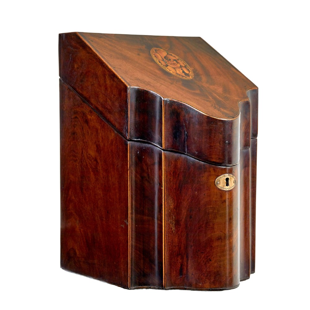 An 18th-century Georgian mahogany knife box featuring a sloping lid with a central floral marquetry inlay, serpentine front profile, and brass keyhole escutcheon. View III