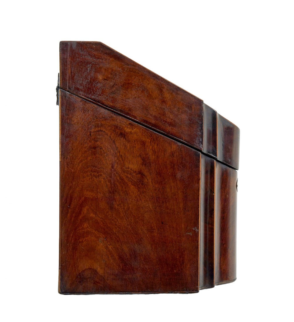 An 18th-century Georgian mahogany knife box featuring a sloping lid with a central floral marquetry inlay, serpentine front profile, and brass keyhole escutcheon. View IV