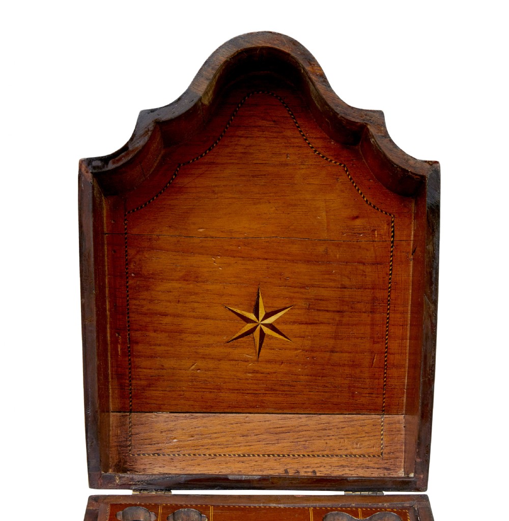 An 18th-century Georgian mahogany knife box featuring a sloping lid with a central floral marquetry inlay, serpentine front profile, and brass keyhole escutcheon. View X