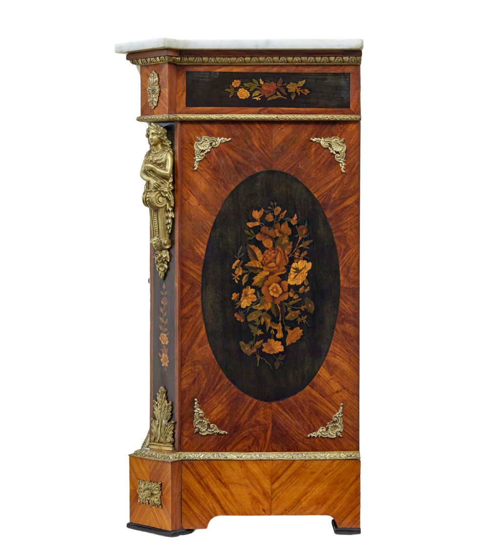 A 19th-century Louis XVI style meuble dappui featuring floral marquetry wood inlays, gilt-bronze mounts, twin doors, and a white marble top. View VI