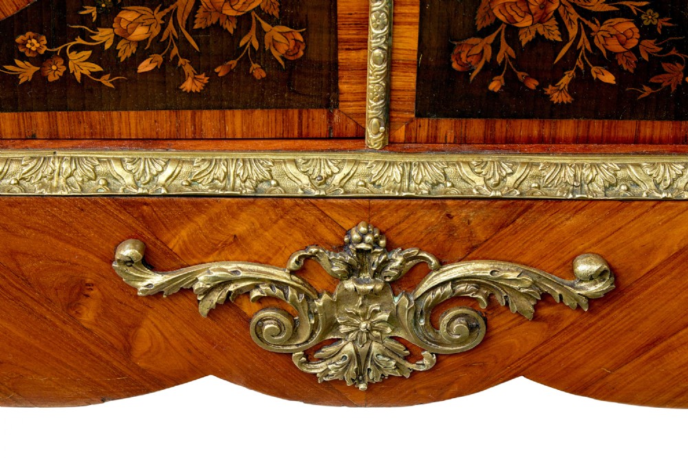 A 19th-century Louis XVI style meuble dappui featuring floral marquetry wood inlays, gilt-bronze mounts, twin doors, and a white marble top. View IX
