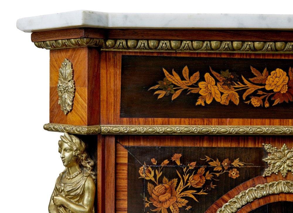 A 19th-century Louis XVI style meuble dappui featuring floral marquetry wood inlays, gilt-bronze mounts, twin doors, and a white marble top. View XI