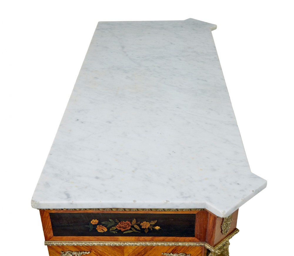 A 19th-century Louis XVI style meuble dappui featuring floral marquetry wood inlays, gilt-bronze mounts, twin doors, and a white marble top. View XII