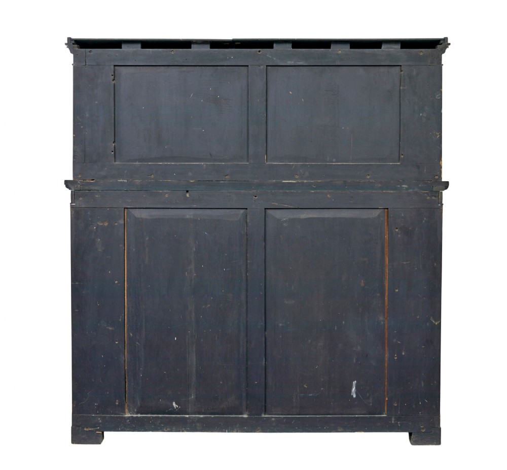 A mid 19th-century dark palisander wood chiffonier with turned columns, glazed cabinet doors, and an upper display shelf structure with mirror backing. View V