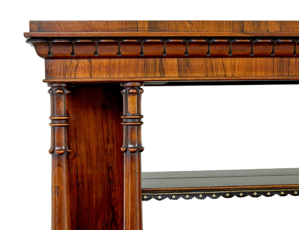 A mid 19th-century dark palisander wood chiffonier with turned columns, glazed cabinet doors, and an upper display shelf structure with mirror backing. View VIII