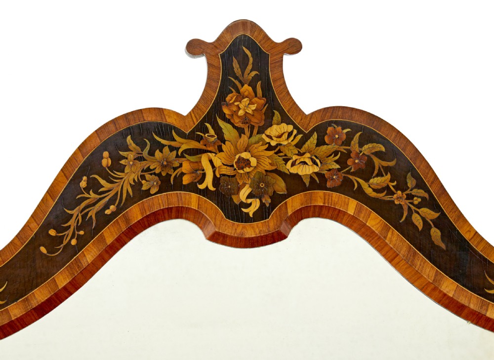 A High Victorian burr walnut credenza featuring floral marquetry inlay, glazed side display cabinets, gilt metal mounts, and a shaped mirror frame superstructure. View XI