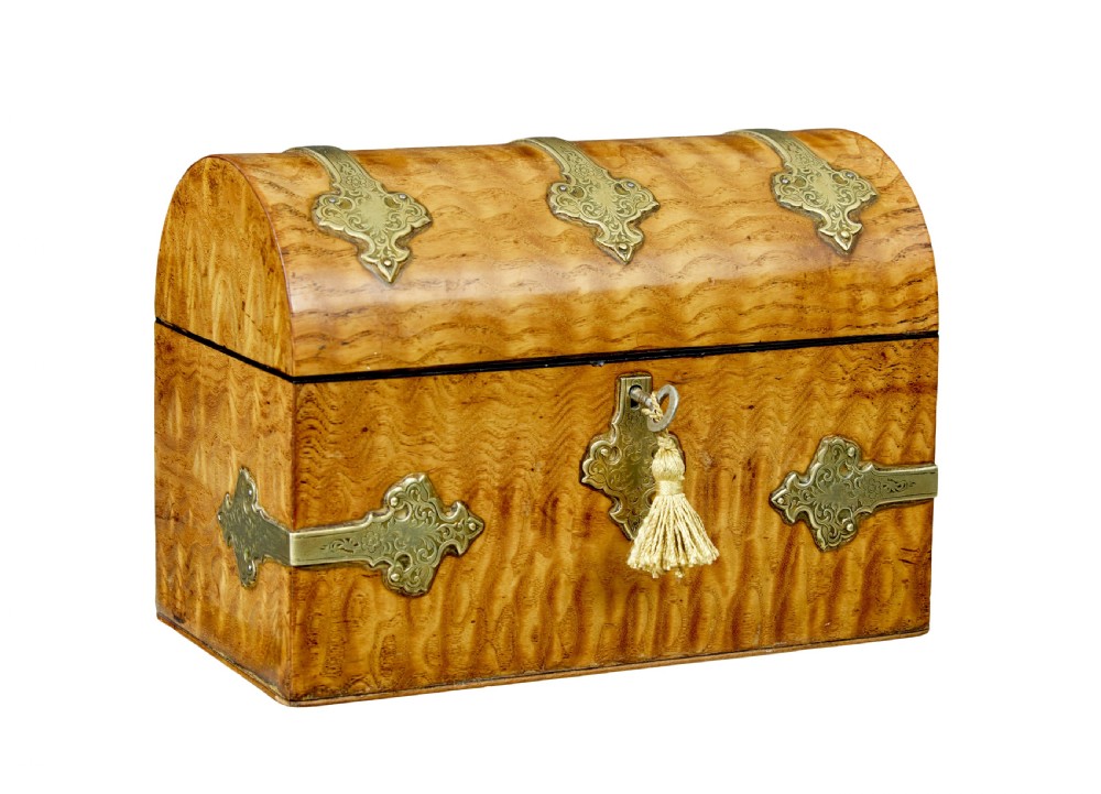 A nineteenth-century dome-topped pollard oak stationery box featuring ornate engraved brass strapwork mounts and a key in the lock escutcheon. View II