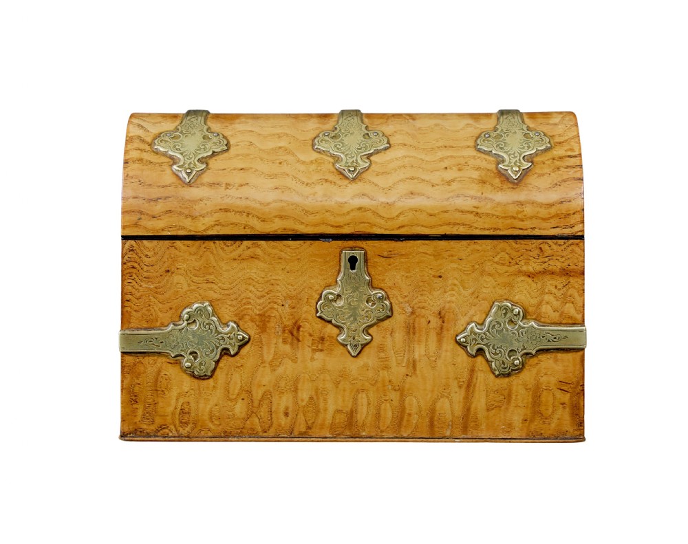 A nineteenth-century dome-topped pollard oak stationery box featuring ornate engraved brass strapwork mounts and a key in the lock escutcheon. View IV
