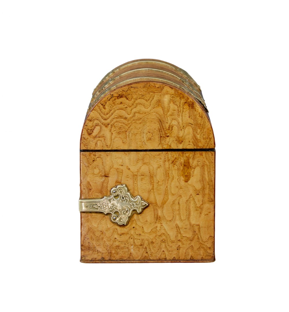 A nineteenth-century dome-topped pollard oak stationery box featuring ornate engraved brass strapwork mounts and a key in the lock escutcheon. View V