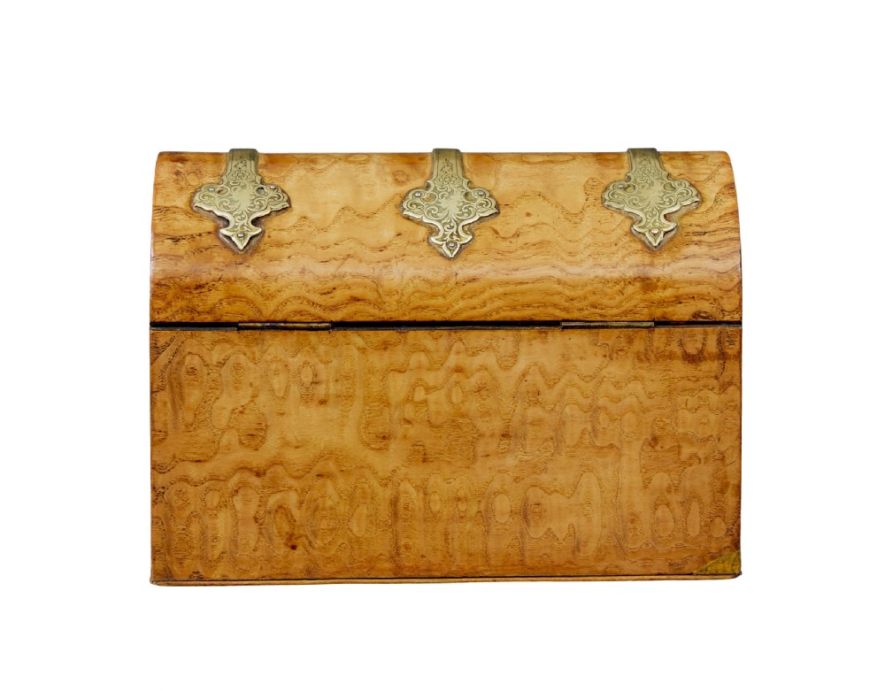A nineteenth-century dome-topped pollard oak stationery box featuring ornate engraved brass strapwork mounts and a key in the lock escutcheon. View VI