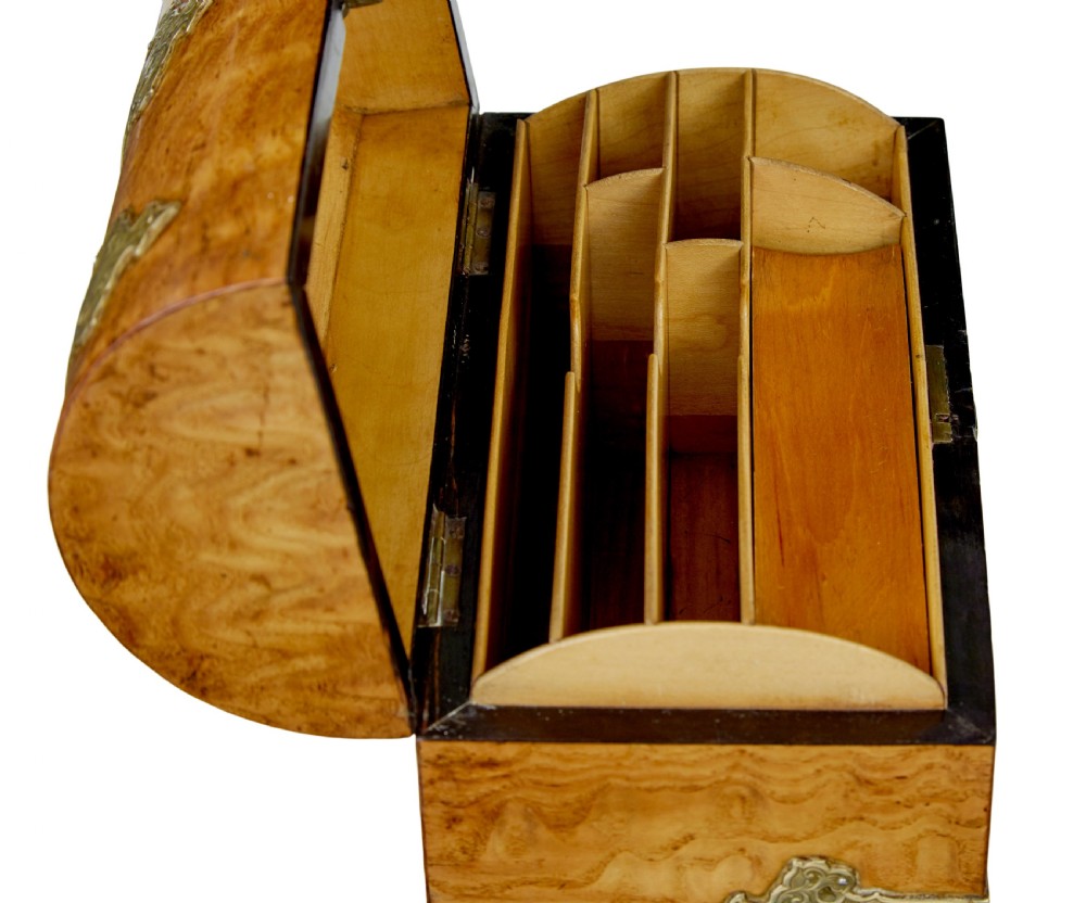 A nineteenth-century dome-topped pollard oak stationery box featuring ornate engraved brass strapwork mounts and a key in the lock escutcheon. View VIII