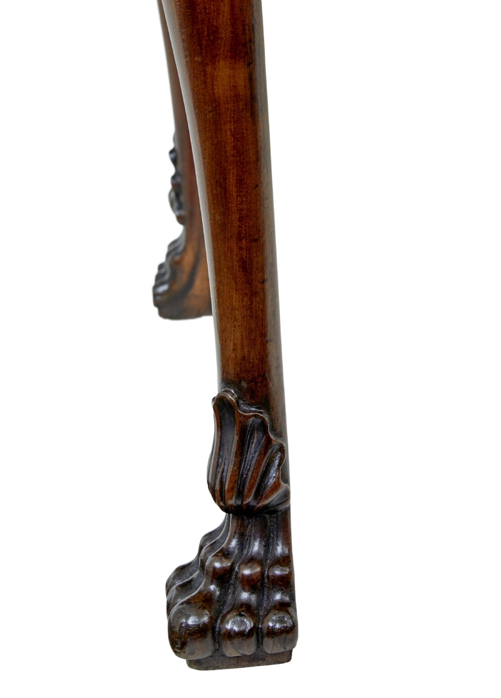An early nineteenth-century Irish mahogany serving table with a carved central shell motif, scalloped frieze, cabriole legs, and carved feet. View IX