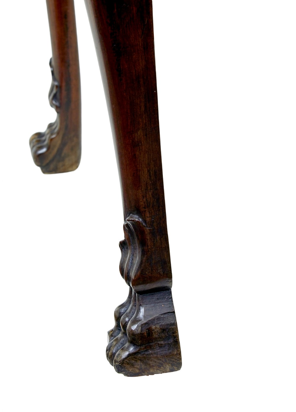 An early nineteenth-century Irish mahogany serving table with a carved central shell motif, scalloped frieze, cabriole legs, and carved feet. View XI