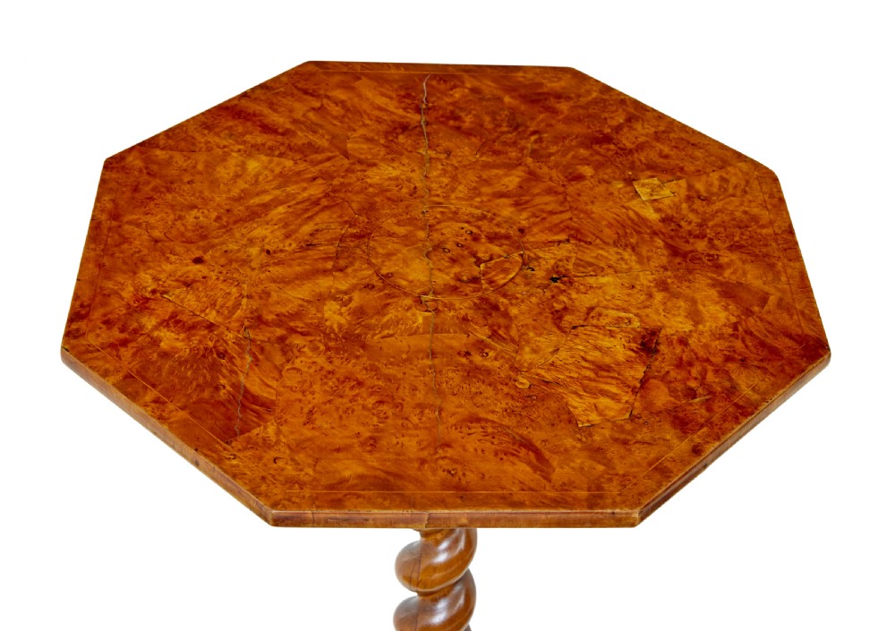 A 19th-century octagonal side table crafted from figured burr elm with a barley twist central column and tripod scrolled feet. View V