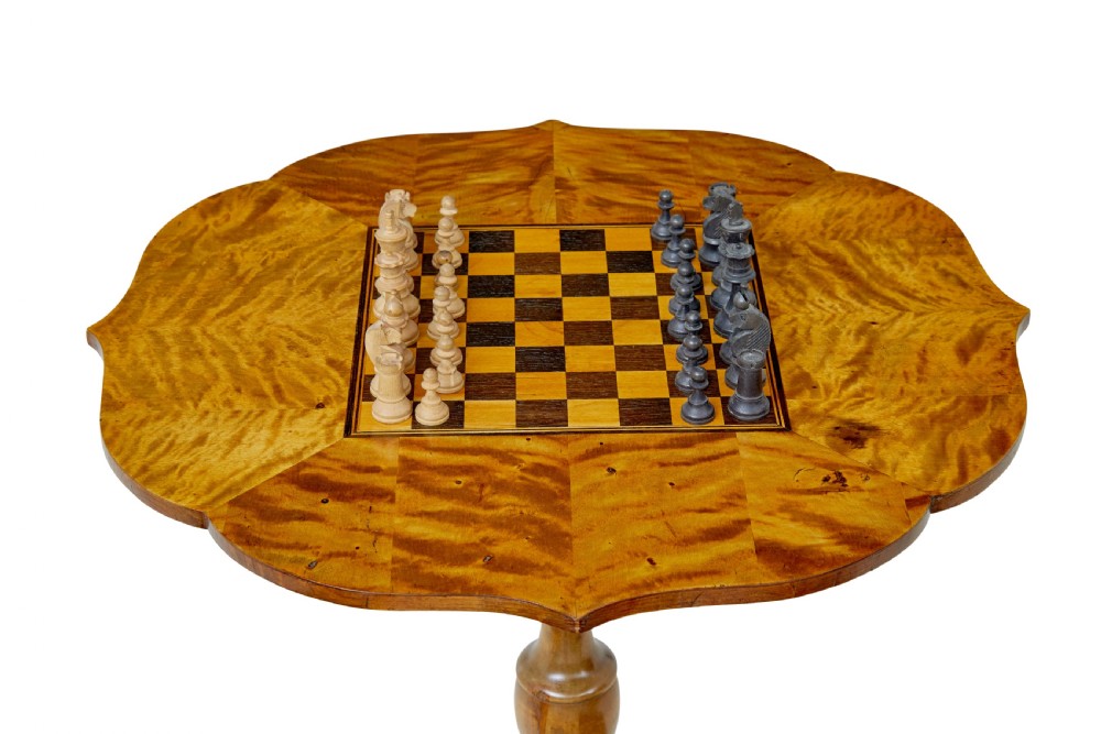 A 19th-century Swedish games table crafted from birch timber, featuring a lobed top with an inlaid wooden chessboard set upon a turned pedestal and tripod legs. View II