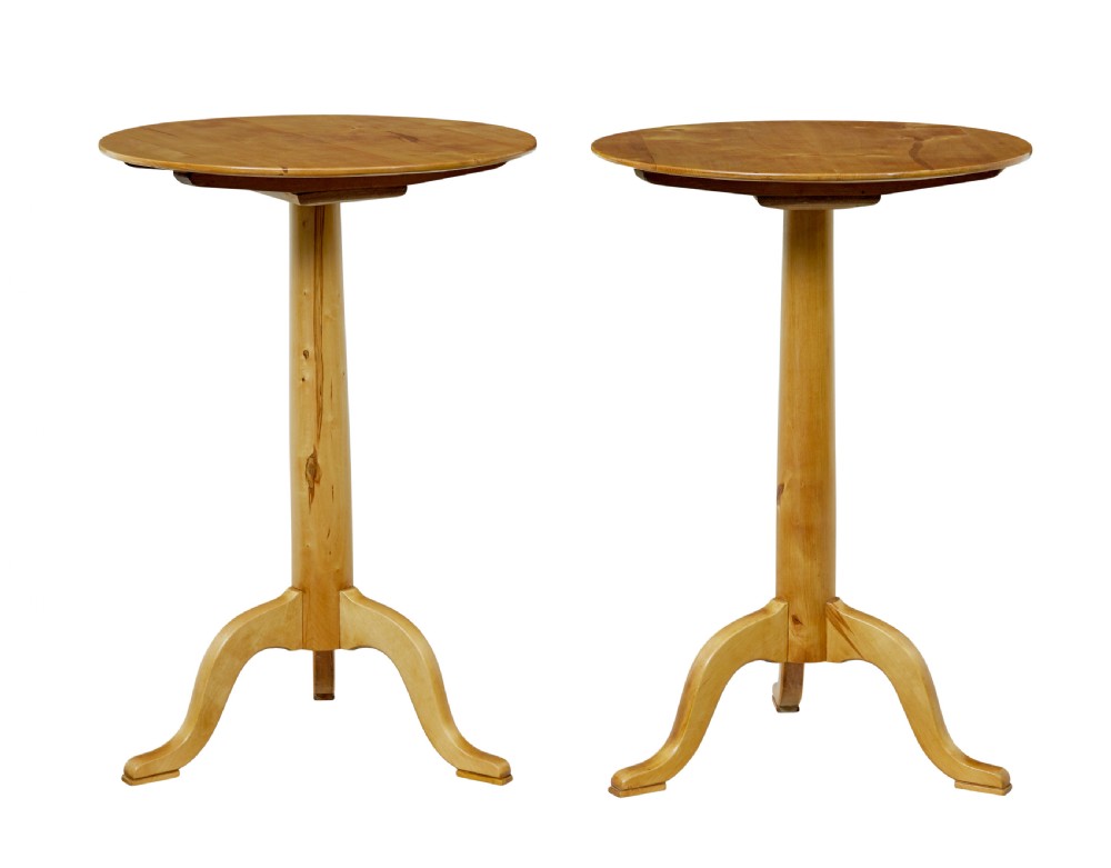 A pair of 19th-century Swedish light birch side tables featuring circular tops supported by turned central pedestals and tripod legs. View V