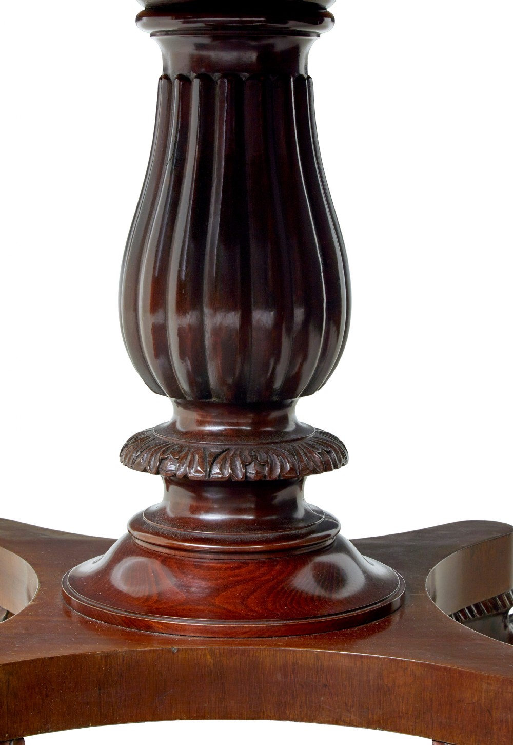 A nineteenth-century mahogany oval centre table featuring a fluted pedestal stem and carved paw feet on a concave quadripartite base. View VIII