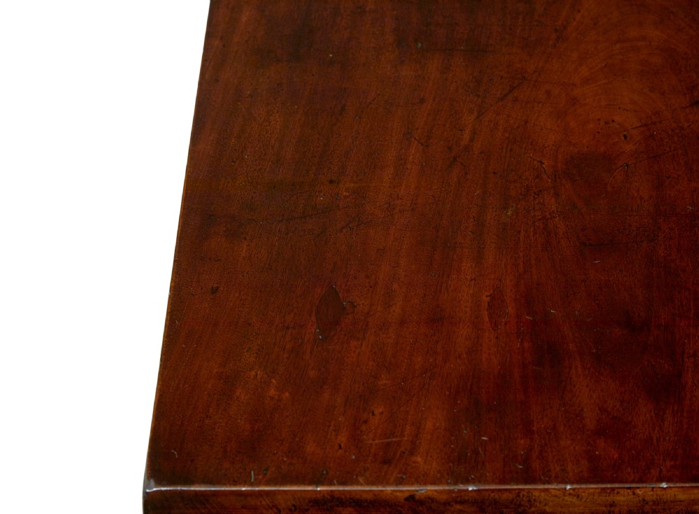 A 19th-century dark mahogany serving table featuring carved cabriole legs, claw feet, and a carved central apron mask. View XII