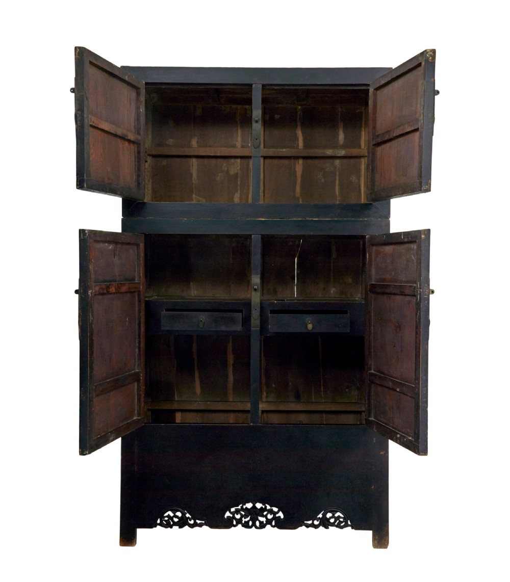 A pair of tall 19th-century black lacquered Chinese compound cabinets featuring circular brass lockplates and carved apron bases. View III